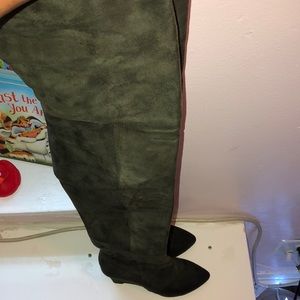 Thigh high wedged boots